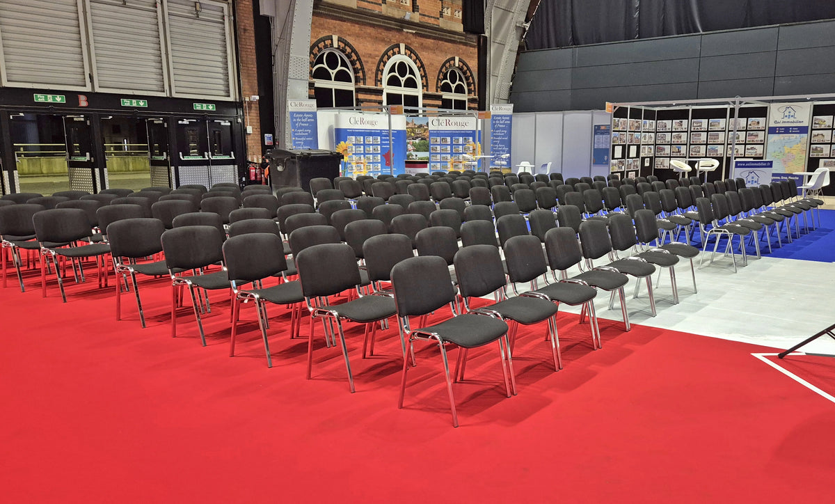 Exhibition hall set with rows of hired conference chairs