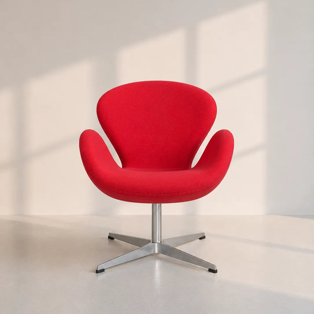 Image of A modern red upholstered swivel lounge chair with a chrome four-star base, set against a minimalist off-white wall with soft window shadow projections.
