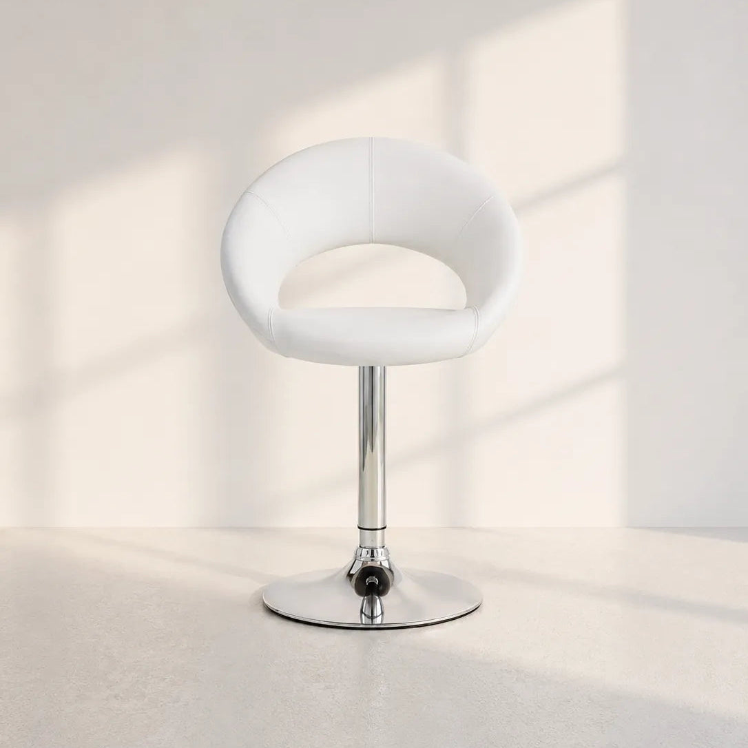 Image of A modern white upholstered swivel bar stool with a chrome pedestal base and circular foot, photographed in a minimalist interior with soft window-light shadows on a light wall and floor.