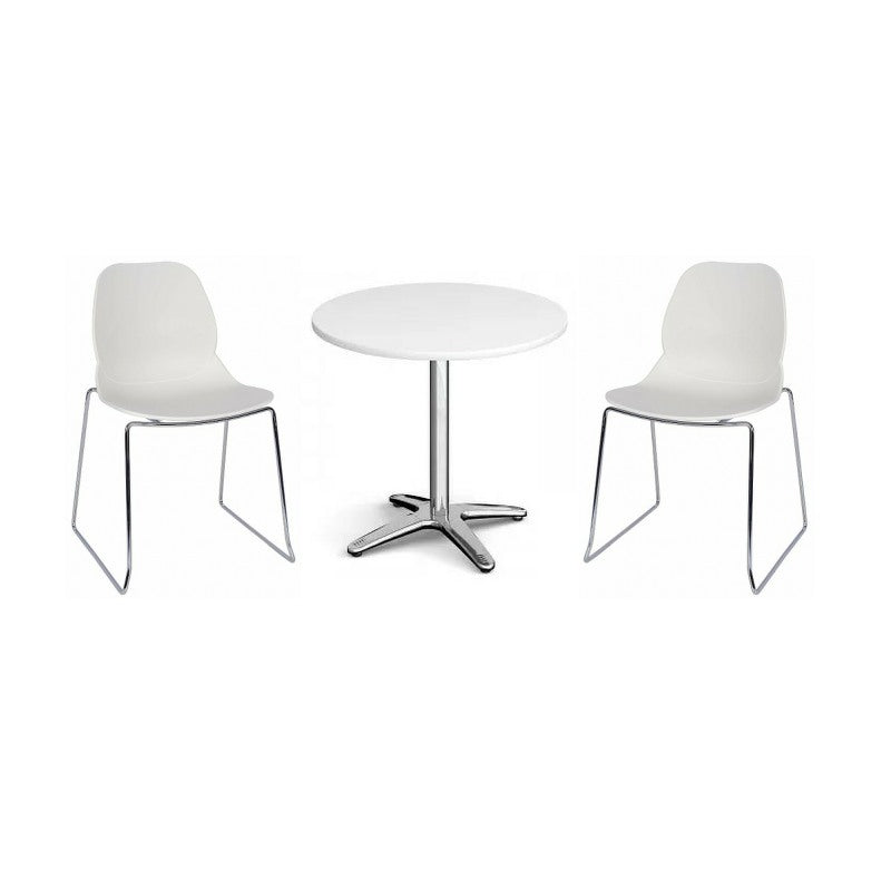 Two white chairs and a round table 