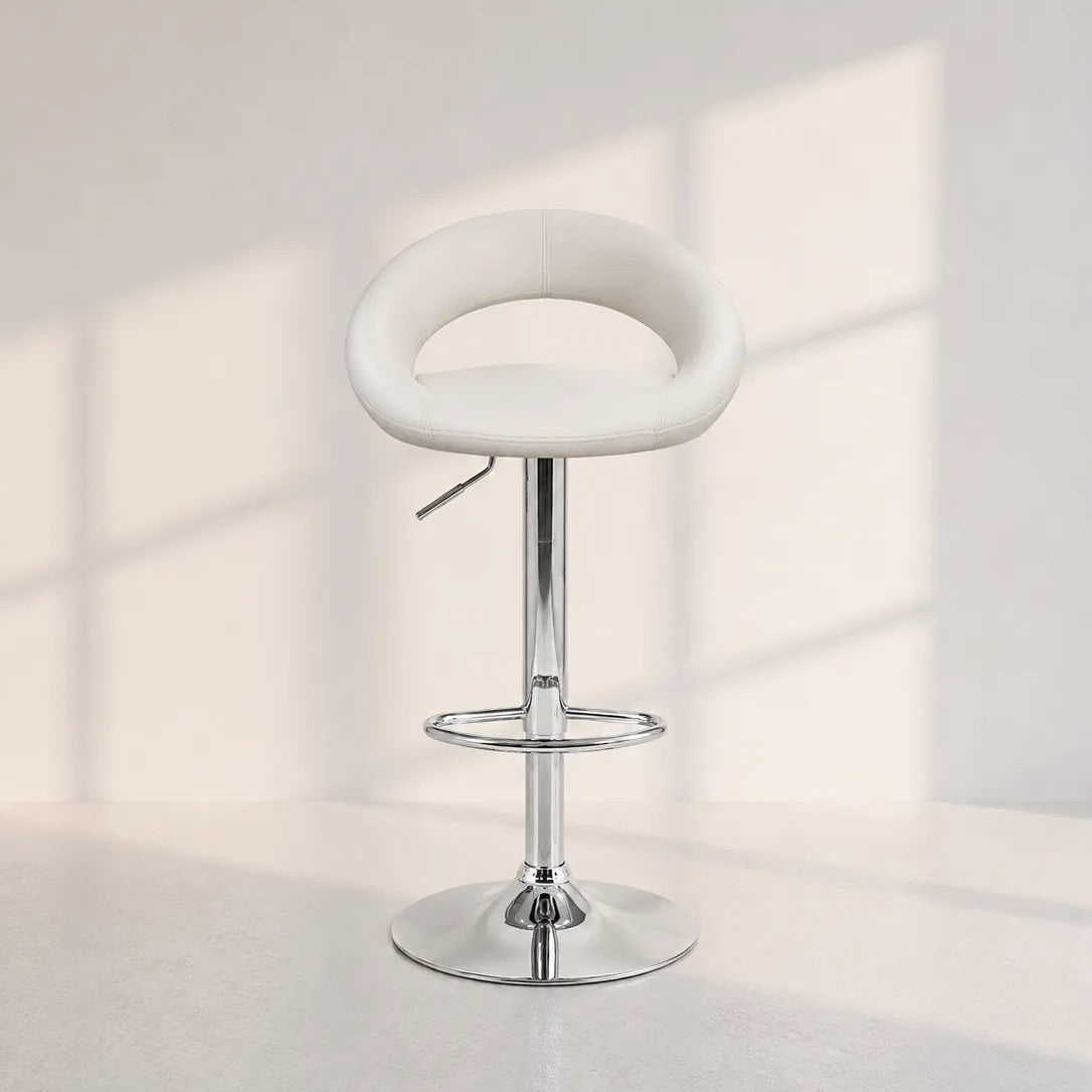 Image of A modern adjustable bar stool with a white curved seat and a polished chrome pedestal base, set against a minimalist off-white wall with soft window shadow patterns.